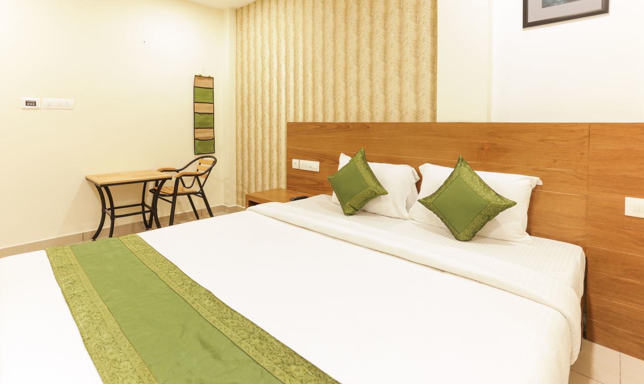 Treebo Trend Cmks Gulmohar Suites Kochi Eksteriør billede