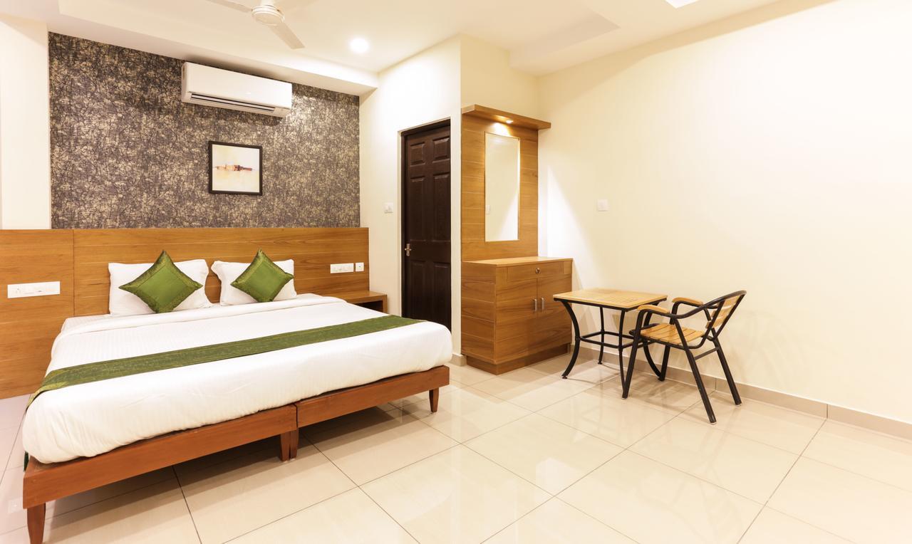 Treebo Trend Cmks Gulmohar Suites Kochi Eksteriør billede