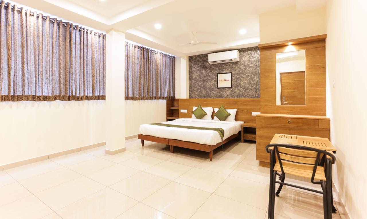 Treebo Trend Cmks Gulmohar Suites Kochi Eksteriør billede