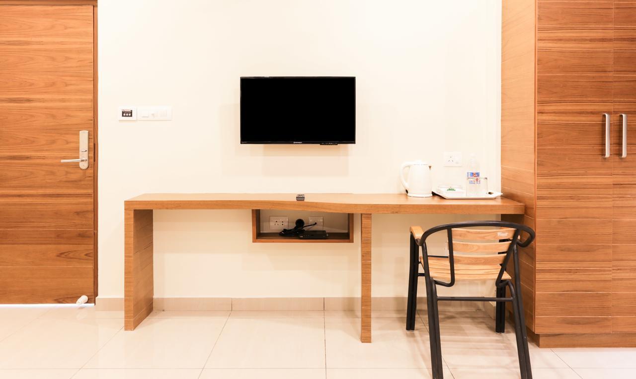Treebo Trend Cmks Gulmohar Suites Kochi Eksteriør billede