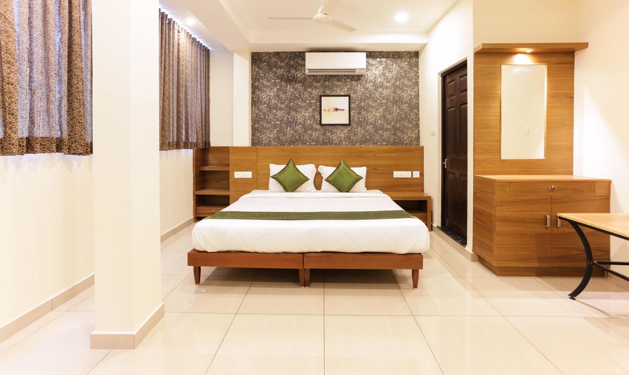 Treebo Trend Cmks Gulmohar Suites Kochi Eksteriør billede